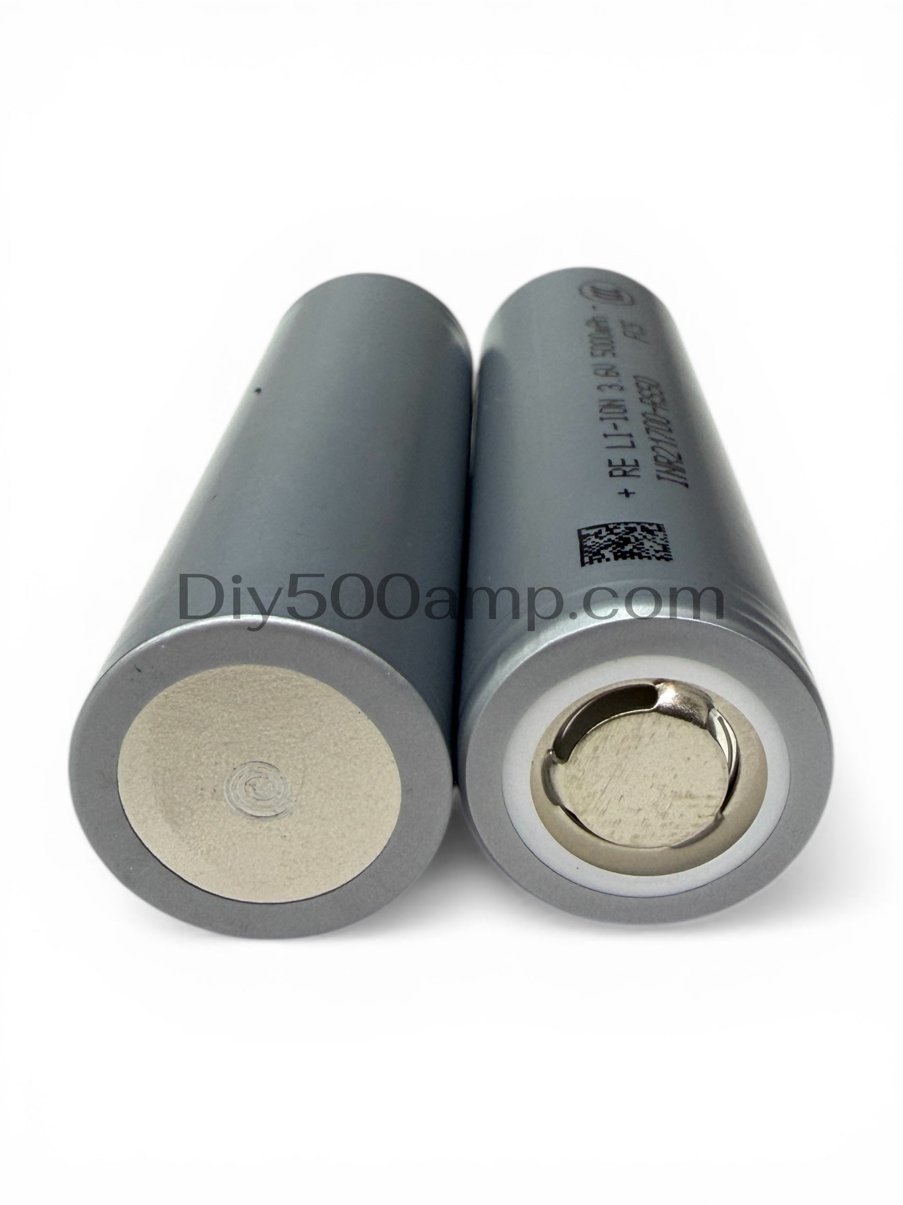 Two Reliance RS50 21700 5000mAh 70A tabless lithium-ion battery cells, bottom view