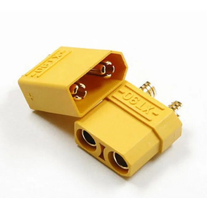 Genuine AMASS XT90H male and female connector pair with yellow insulating end caps