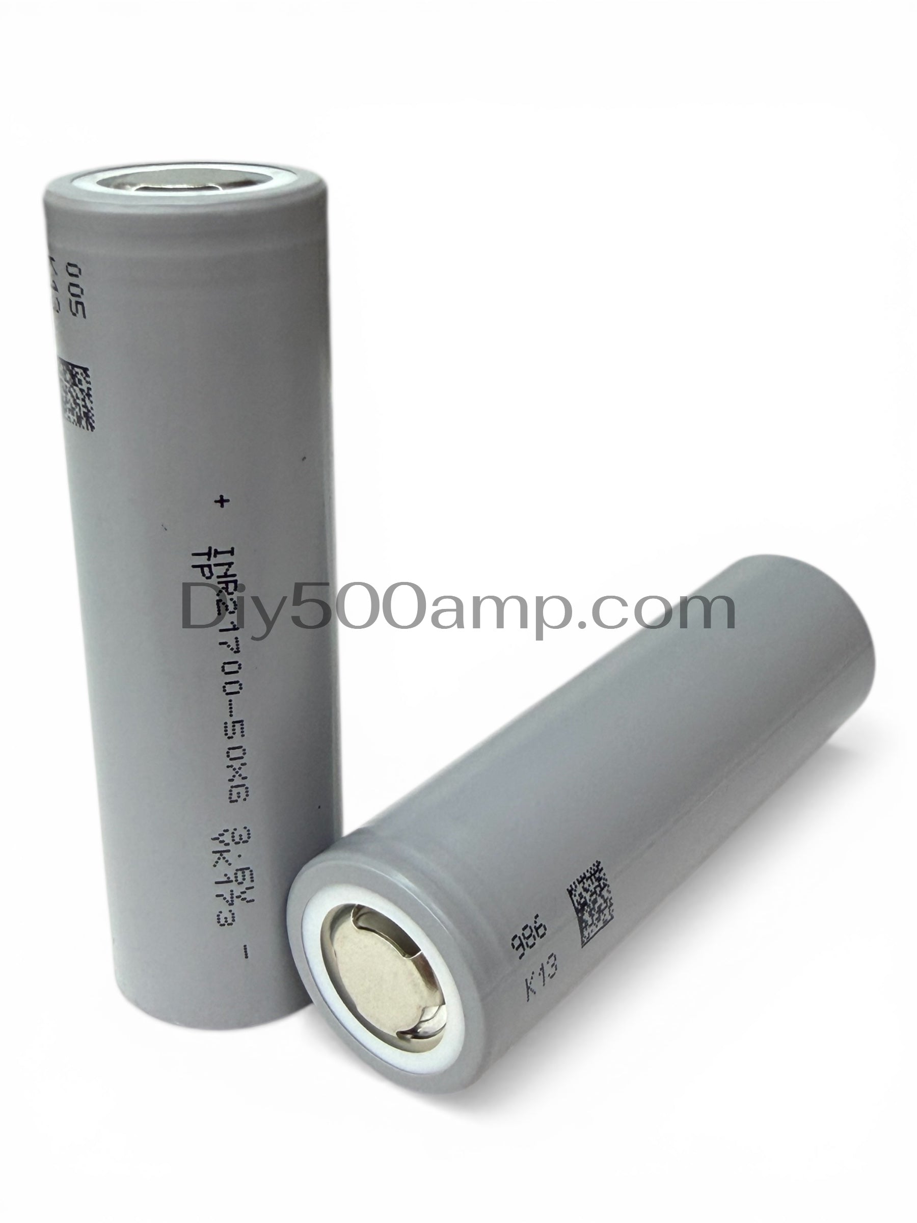 Two TENPOWER 50XG 21700 5000mAh tabless battery cells, upright and side view